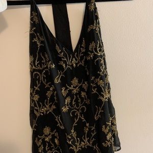 Alice + Olivia black top with gold sequins